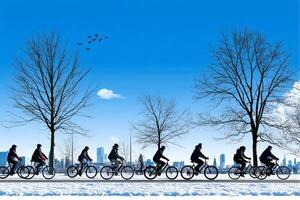 A group of people riding bicycles in the snow photo