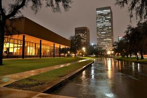 A river that runs through a park at night photo