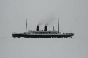 A large steam ship in the middle of the ocean photo