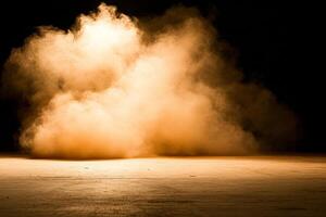 A large cloud of smoke is seen in the dark photo