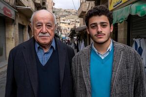 Two men standing in a narrow street with buildings in the background photo
