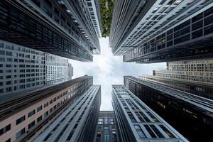 A view of tall buildings looking up at each other photo