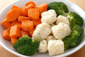 A white bowl of vegetables photo