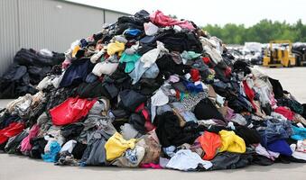 A pile of clothes is sitting on top of a building photo