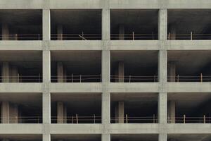 A building with many balconies and bars photo