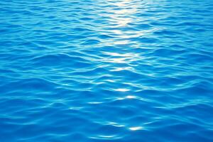 blue ocean background with sun shining through the water photo