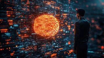 A man standing in front of a digital wall with a glowing orange orb photo
