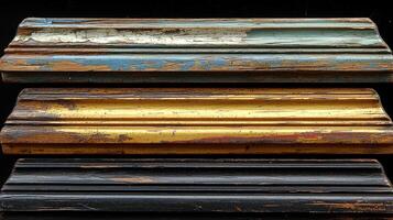 Three different colored wood pieces are shown photo
