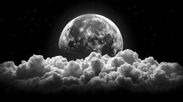 A black and white photo of the moon and clouds