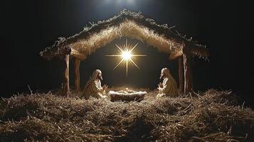 The nativity scene with three people in the manger photo
