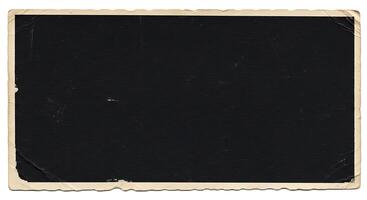 An old black photo frame with a white border
