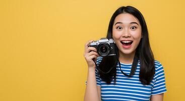 A woman holding a camera and making a surprised face photo