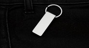A keychain with a metal rectangle on it photo