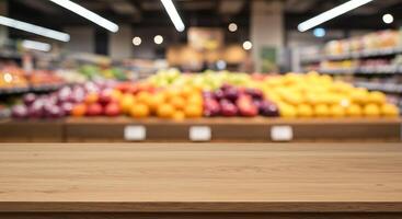 Empty wooden table in supermarket with blurred background photo