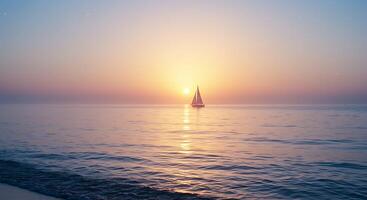 A sailboat is sailing on the ocean at sunset photo
