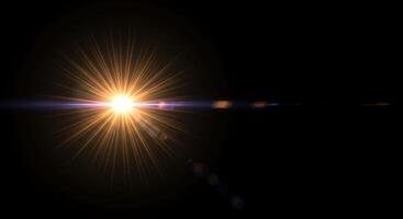 A bright light shines from the top of a black background photo