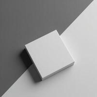 White square box on a grey and white background photo