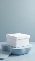 Stacked white boxes on soft circular base photo