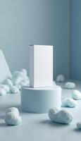 White box mockup on blue background with clouds photo