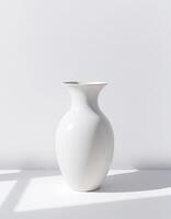 Tall White Pot with Soft Side Light and Cast Shadow photo