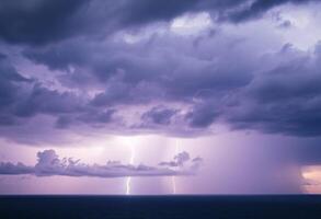 Lightning over the ocean with clouds and dark clouds photo