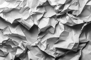 Close-up view of crumpled white paper texture. photo