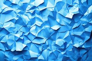 Close-up view of crumpled, vibrant blue paper texture. photo