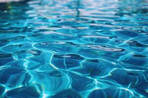Close-up view of rippling turquoise pool water. photo