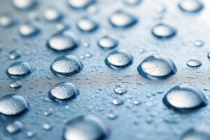 Close-up view of water droplets on a smooth surface. photo