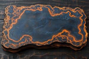 Intricate design on a dark wooden surface. photo