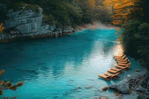 Turquoise river scene with wooden platforms. photo