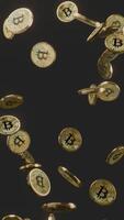 Bitcoin Coins Dropping Slowly, 3D Cryptocurrency Vertical Animation on Dark Background video