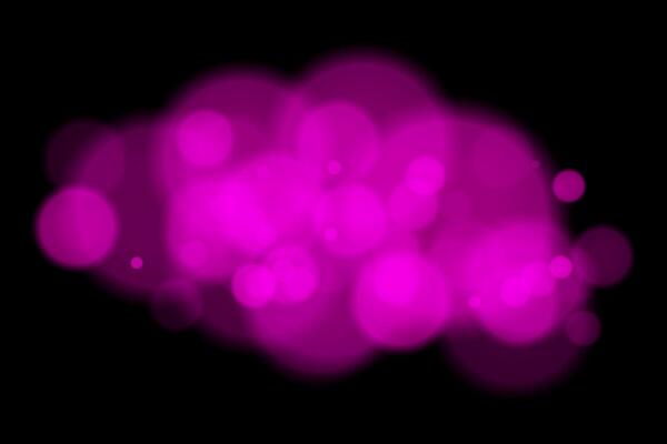 A pink light is shown on a black background