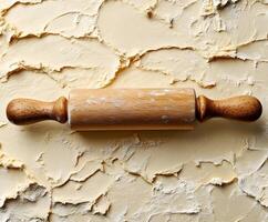 A rolling pin on a white background photo