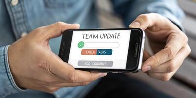 Team update on mobile phone photo