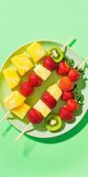 Ultra realistic display of colorful fruit skewers on vibrant green background for culinary arts photo