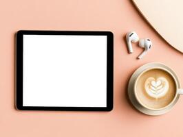 Modern tablet with blank screen and coffee for digital design inspiration photo
