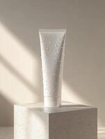 High definition minimalist product image of moisture enhanced cream tube on textured pedestal photo