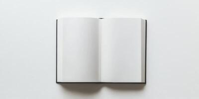 Top view of open blank white book for writing and sketching photo