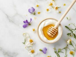 Golden honey drizzle on yogurt with fresh flowers for natural dessert inspiration photo