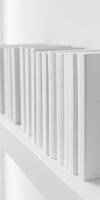 Minimalist white bookshelf with aligned books for modern interior design photo