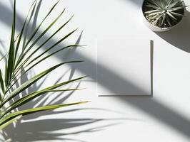Ultra realistic minimalist top down shot of blank white square on modern desktop photo