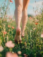 Serene walk barefoot through a flowering meadow on a sunny day photo