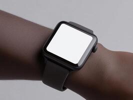 Modern smartwatch on wrist against light background for technology design photo