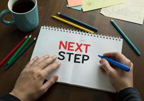 notebook on student desk showing next step message photo