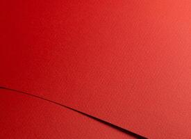 Red paper texture with fire red and scarlet tones, bold geometric lines and textured surface, clean photo