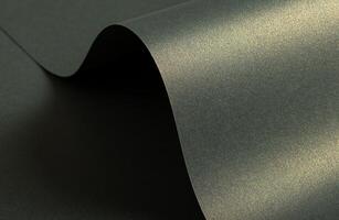 Paper texture with wavy folded surface, glossy finish and glistering shimmer, warm yellowish and photo