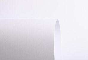 Paper texture with pure white tone, clean smooth surface and folded wavy composition, bright white photo