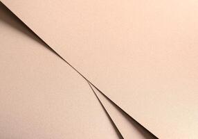 Paper texture with soft beige and light gold tones, glossy glistering surface with geometric layered photo