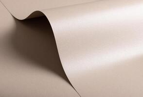 Paper texture with soft beige and pink tones, glossy pearlescent surface with shimmering glitter photo